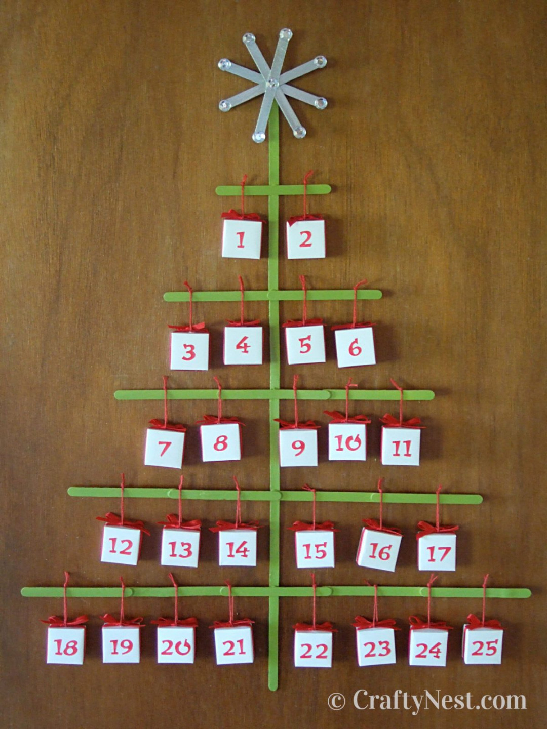 DIY craft-stick Christmas tree advent calendar with "origami